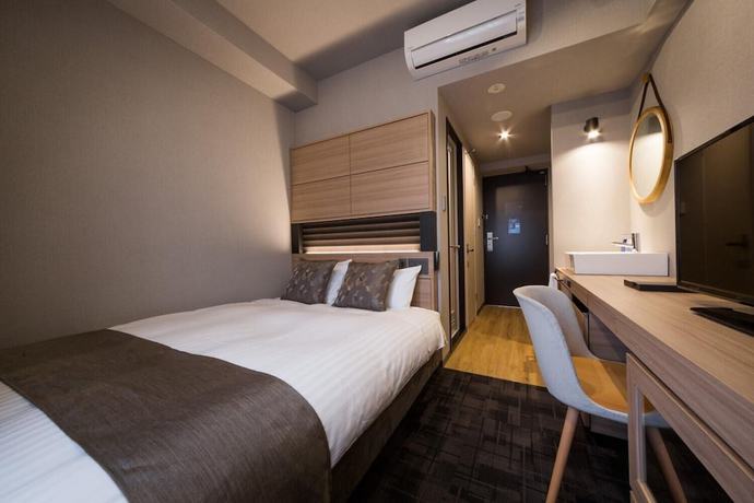 Imagen de la habitación del Hotel S-peria Hakata. Foto 16