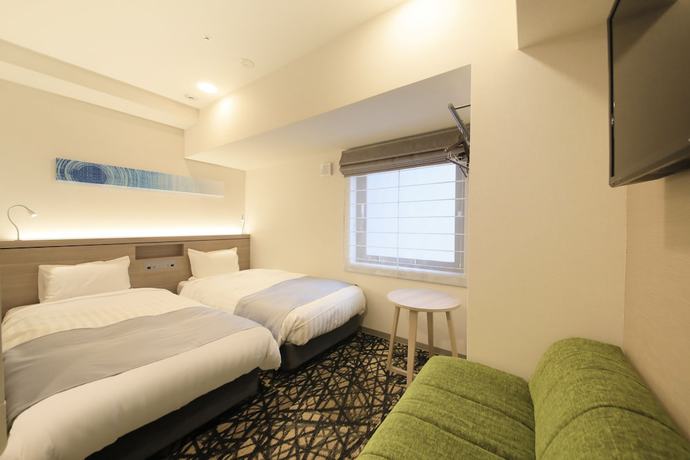 Imagen de la habitación del Hotel S-peria Inn Osaka Hommachi. Foto 11