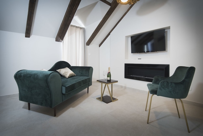 Imagen de la habitación del Hotel Sperone Luxury Accommodation. Foto 4