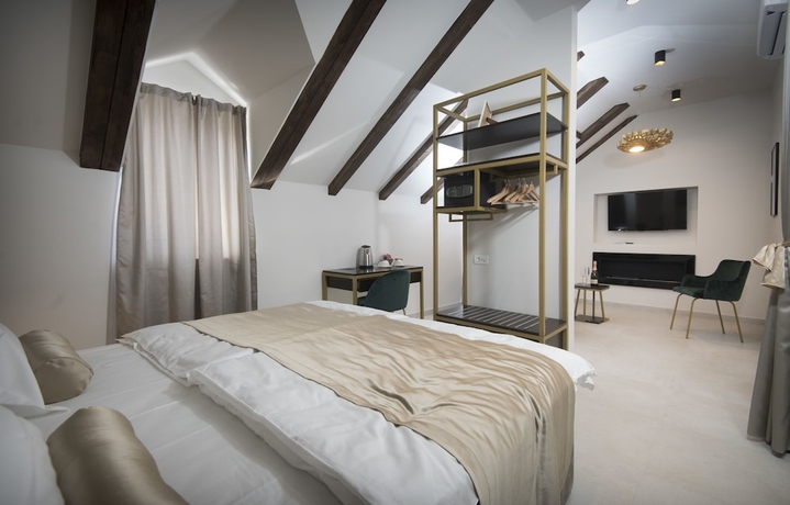 Imagen de la habitación del Hotel Sperone Luxury Accommodation. Foto 5