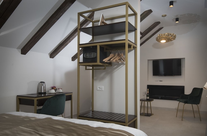 Imagen de la habitación del Hotel Sperone Luxury Accommodation. Foto 12