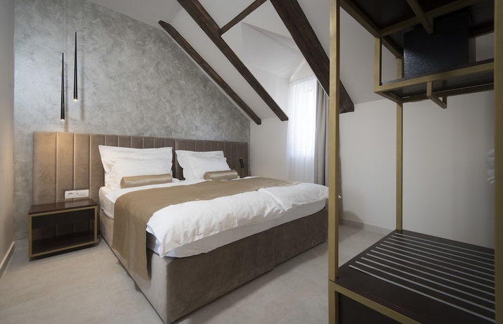 Imagen de la habitación del Hotel Sperone Luxury Accommodation. Foto 15