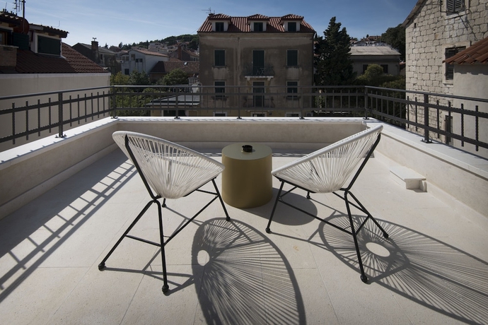 Imagen de la habitación del Hotel Sperone Luxury Accommodation. Foto 17