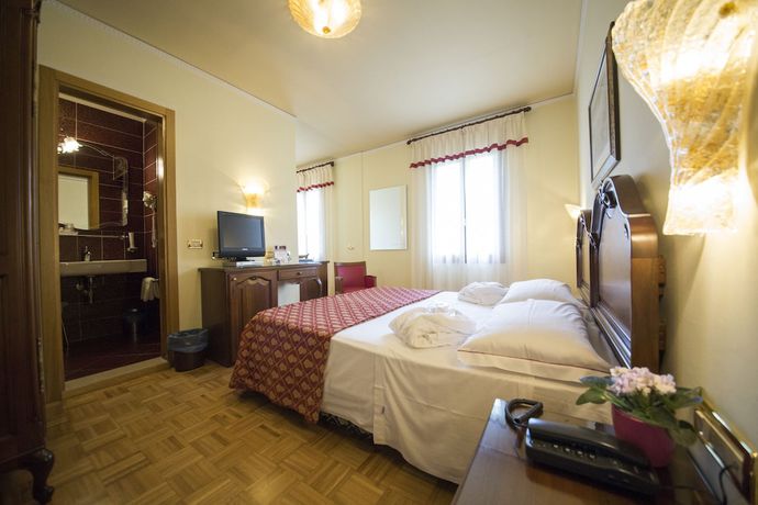 Imagen de la habitación del Hotel Spessotto. Foto 16
