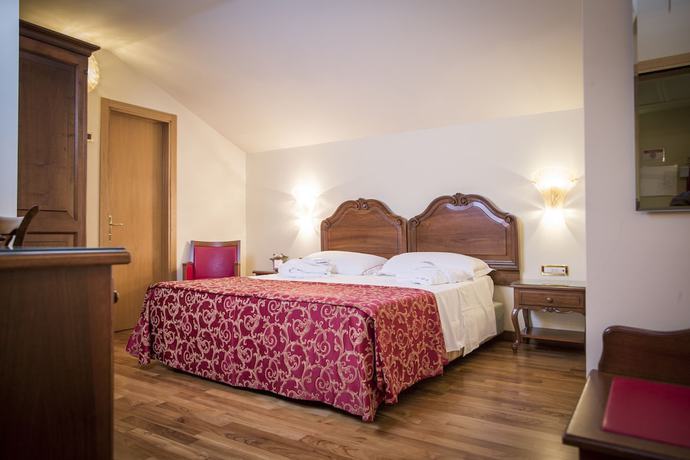 Imagen de la habitación del Hotel Spessotto. Foto 18