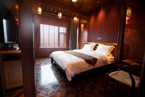 Imagen de la habitación del Hotel 众里千寻古风酒店丨Spirited Silky Inn丨Dali Old City. Foto 16