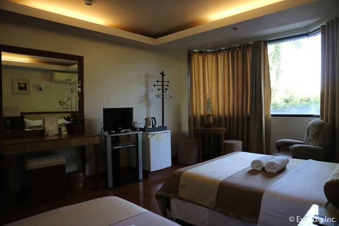 Imagen de la habitación del Hotel Splash Suites Laguna. Foto 4