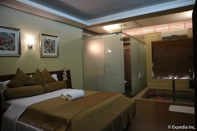Imagen de la habitación del Hotel Splash Suites Laguna. Foto 10