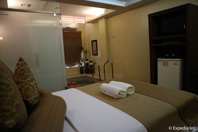Imagen de la habitación del Hotel Splash Suites Laguna. Foto 12