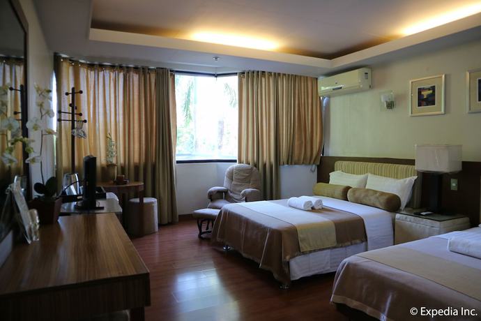 Imagen de la habitación del Hotel Splash Suites Laguna. Foto 13