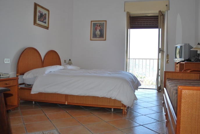 Imagen de la habitación del Hotel Splendid Taormina. Foto 14