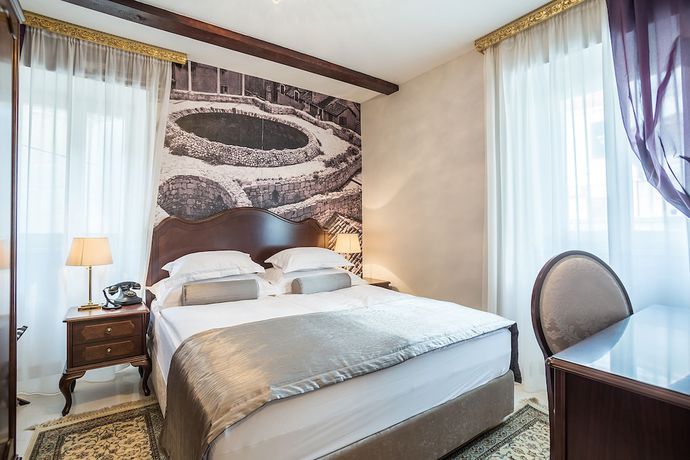 Imagen de la habitación del Hotel Splendida Palace. Foto 7