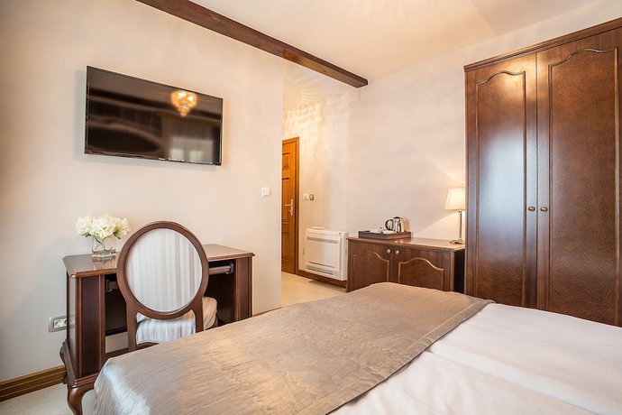 Imagen de la habitación del Hotel Splendida Palace. Foto 10