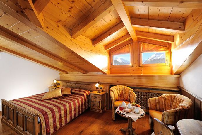 Imagen de la habitación del Hotel Spol Alpine Wellness Spa. Foto 8