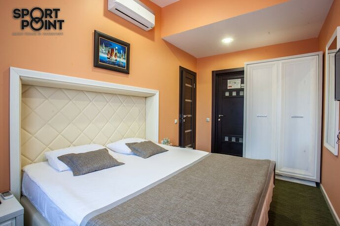 Imagen de la habitación del Hotel Sport Point. Foto 14