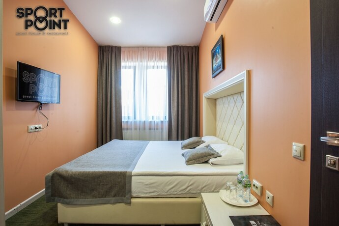 Imagen de la habitación del Hotel Sport Point. Foto 15