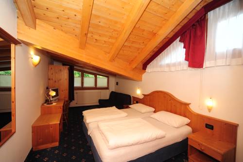 Imagen de la habitación del Hotel Sport Stella Alpina. Foto 16