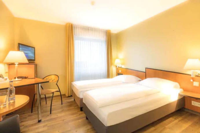 Imagen de la habitación del Hotel Sport - und Tagungshotel De Poort. Foto 3