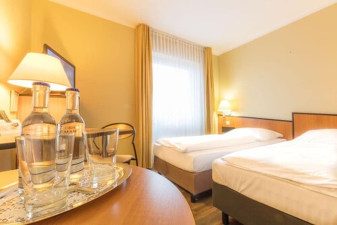 Imagen de la habitación del Hotel Sport - und Tagungshotel De Poort. Foto 6