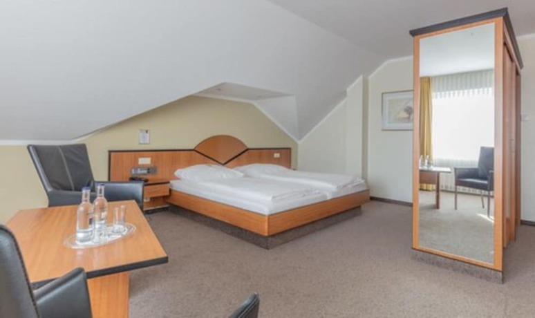 Imagen de la habitación del Hotel Sport - und Tagungshotel De Poort. Foto 7
