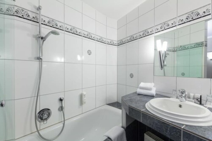 Imagen de la habitación del Hotel Sport - und Tagungshotel De Poort. Foto 8