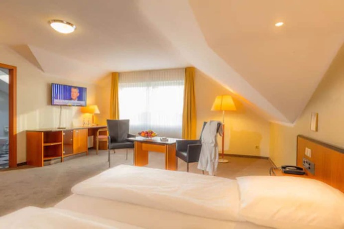 Imagen de la habitación del Hotel Sport - und Tagungshotel De Poort. Foto 10