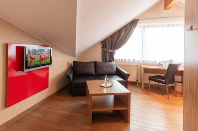 Imagen de la habitación del Hotel Sport - und Tagungshotel De Poort. Foto 11