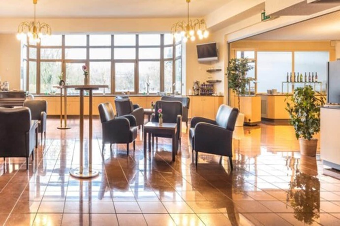 Imagen de los interiores del Hotel Sport - und Tagungshotel De Poort. Foto 18