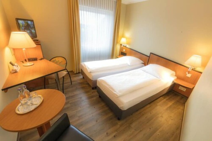 Imagen de la habitación del Hotel Sport - und Tagungshotel De Poort. Foto 14