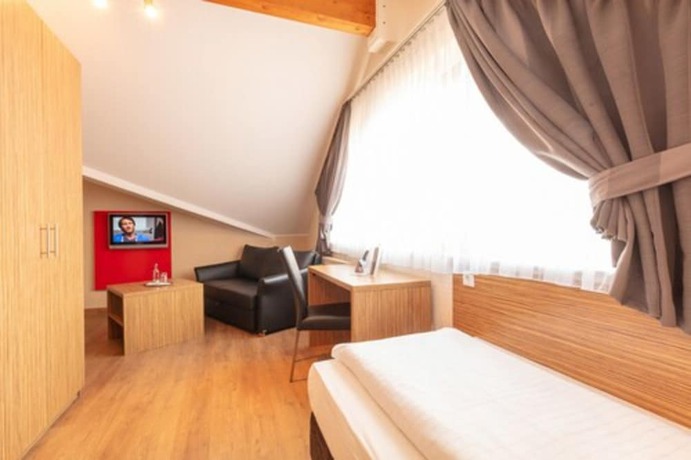 Imagen de la habitación del Hotel Sport - und Tagungshotel De Poort. Foto 15