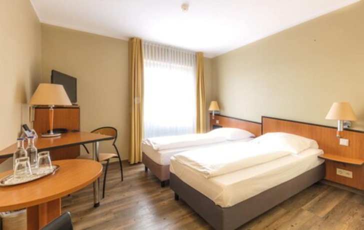 Imagen de la habitación del Hotel Sport - und Tagungshotel De Poort. Foto 16
