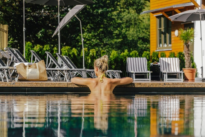 Imagen de la piscina del Hotel Sporthotel Wagrain. Foto 16