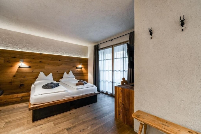 Imagen de la habitación del Hotel Sportony Mountain Lodges. Foto 5