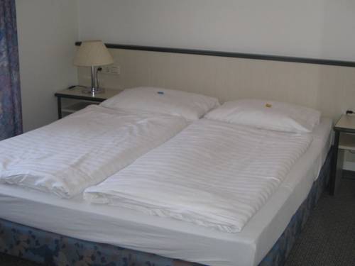 Imagen de la habitación del Hotel Sportpark Isernhagen. Foto 5