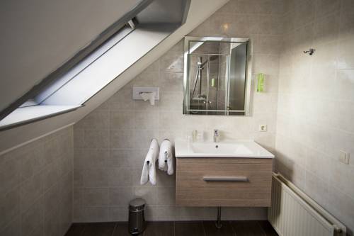 Imagen de la habitación del Hotel Sportsbar and Brasserie Dorhout Mees. Foto 3