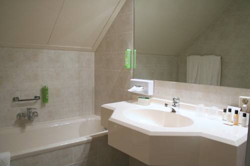 Imagen de la habitación del Hotel Sportsbar and Brasserie Dorhout Mees. Foto 13