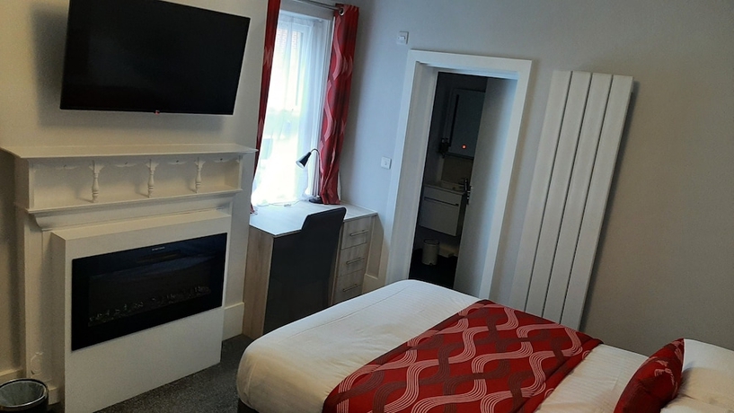 Imagen de la habitación del Hotel Sportsview Guest House. Foto 5