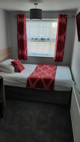 Imagen de la habitación del Hotel Sportsview Guest House. Foto 9