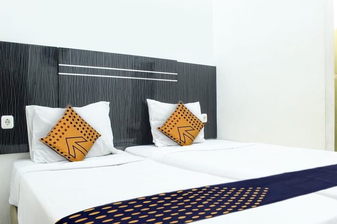 Imagen de la habitación del Hotel Spot ON 3605 Clarichie Guest House. Foto 2