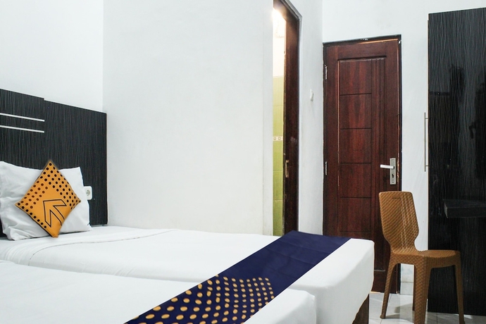 Imagen de la habitación del Hotel Spot ON 3605 Clarichie Guest House. Foto 3