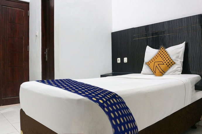 Imagen de la habitación del Hotel Spot ON 3605 Clarichie Guest House. Foto 10