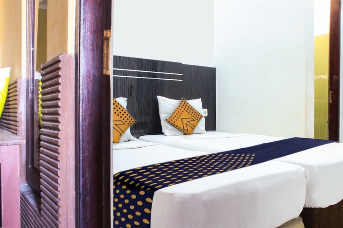 Imagen de la habitación del Hotel Spot ON 3605 Clarichie Guest House. Foto 11