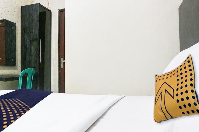 Imagen de la habitación del Hotel Spot ON 3605 Clarichie Guest House. Foto 14