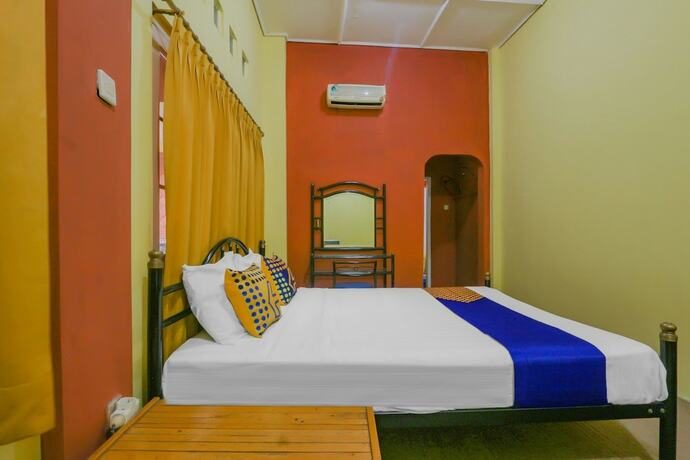 Imagen de la habitación del Hotel Spot ON 90272 Istana Griya 1. Foto 13