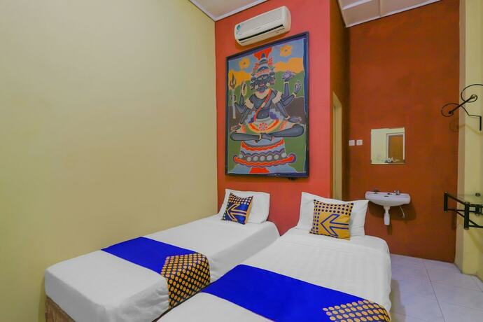 Imagen de la habitación del Hotel Spot ON 90272 Istana Griya 1. Foto 16