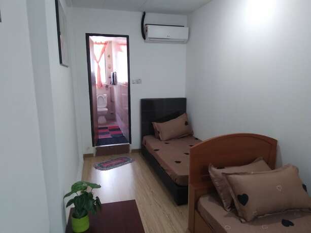 Imagen de la habitación del Hotel Spot ON 90439 Lh Home. Foto 11