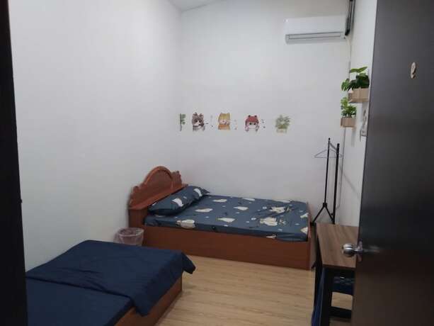 Imagen de la habitación del Hotel Spot ON 90439 Lh Home. Foto 12