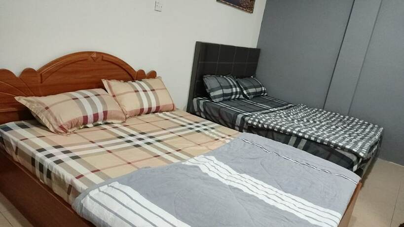 Imagen de la habitación del Hotel Spot ON 90439 Lh Home. Foto 13