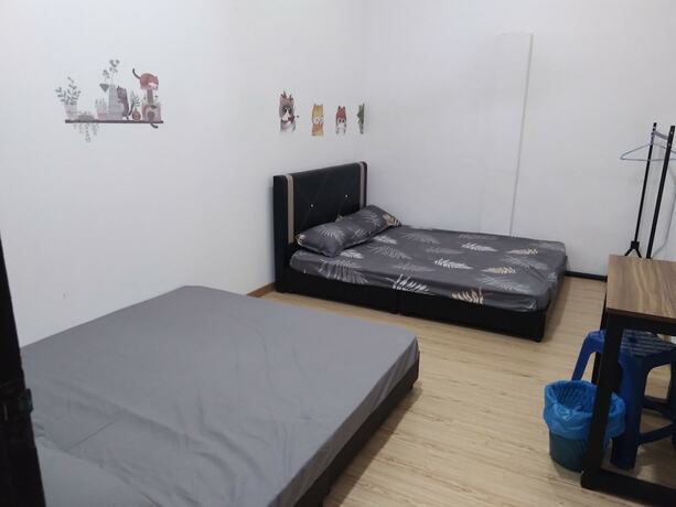 Imagen de la habitación del Hotel Spot ON 90439 Lh Home. Foto 17