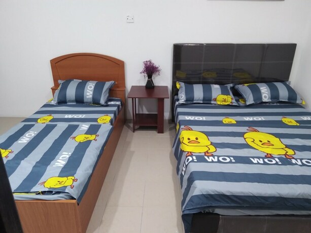 Imagen de la habitación del Hotel Spot ON 90439 Lh Home. Foto 20